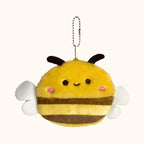Porta-moedas de pelúcia em formato de abelha amarela com listras marrons e asas brancas